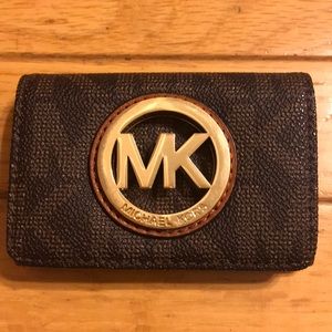 Micheal Kors wallet.  Perfect condition